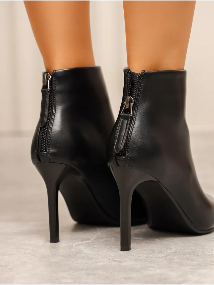 Women’s pointed-toe stiletto ankle boots for mid-season wear