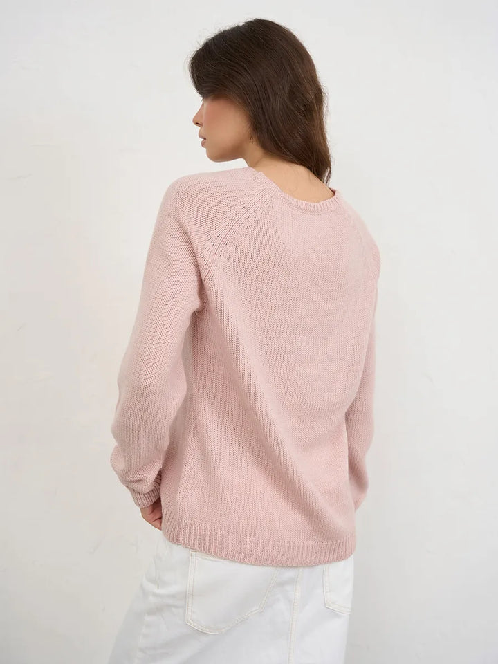 Warm knitted jumper with a neckline