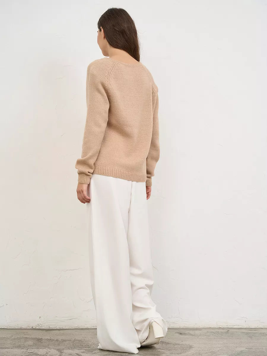 Warm knitted jumper with a neckline