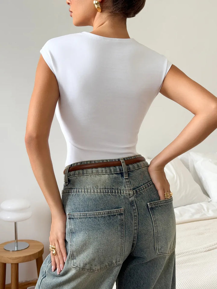 Skims-style fitted top t-shirt for layering under a blazer